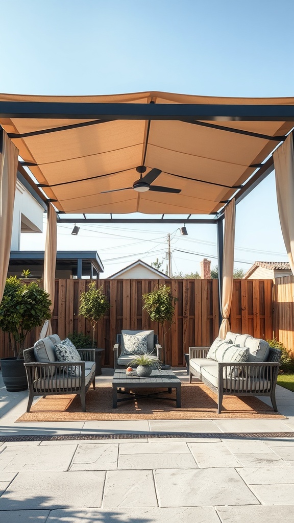 A cozy backyard shade structure with seating and curtains for privacy.